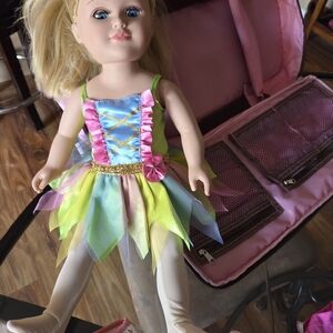 Bundle With Doll, Carrying Case, Clothing and a Few Accessories